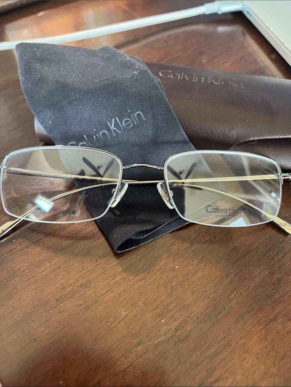 Calvin Klein Men’s Silver Rectangular Metal-Frame Glasses